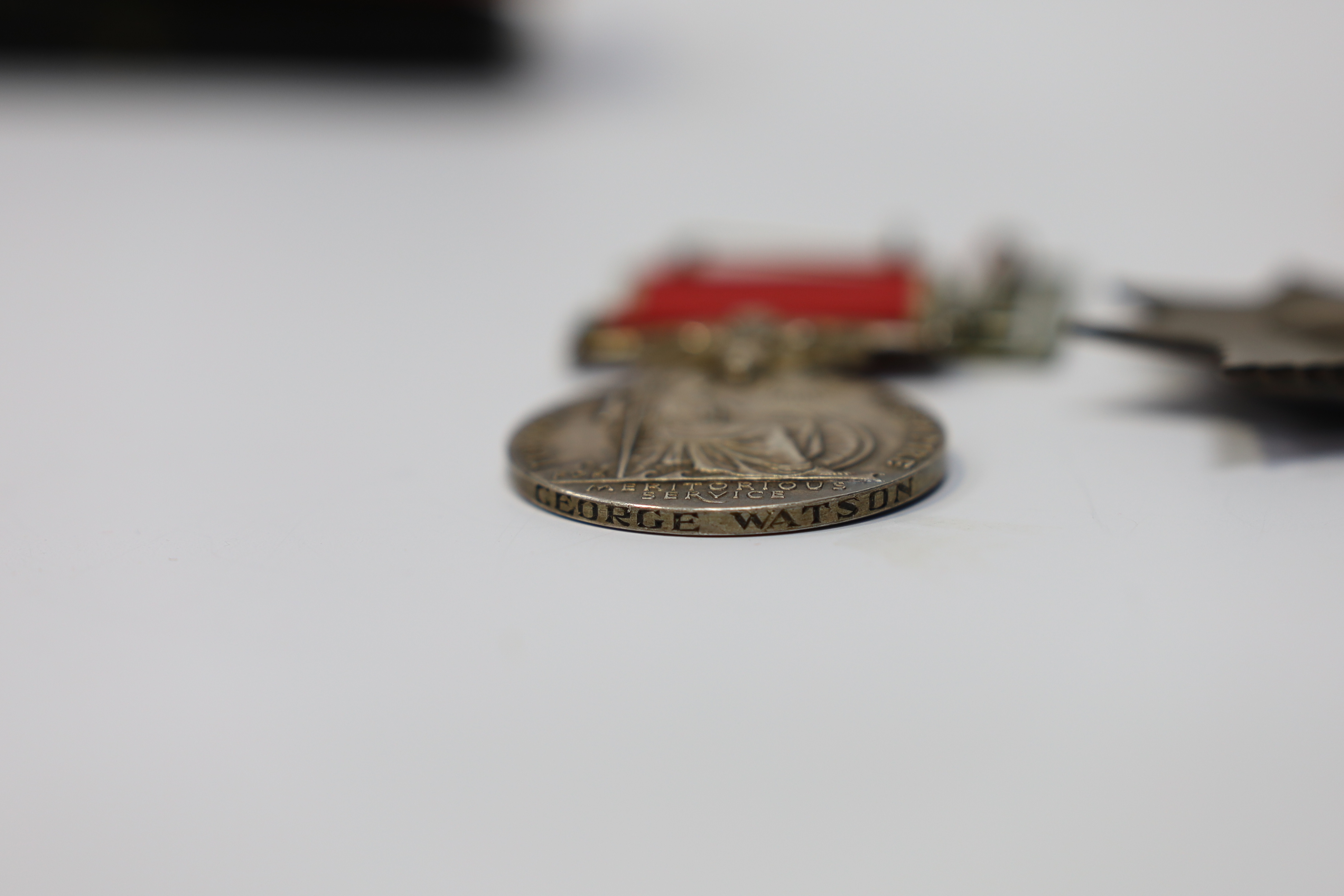 A cased George VI civil issue British Empire medal, awarded to George Watson, together with a cased George V Imperial Service Medal awarded to Richard Braid (2). Condition - fair to good